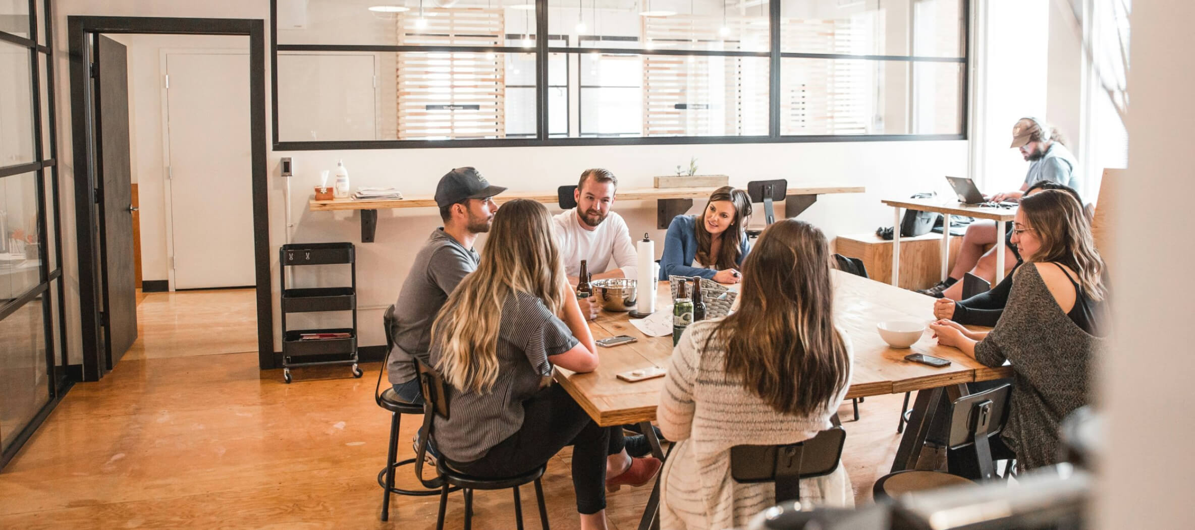 Students collaborating in modern workspace